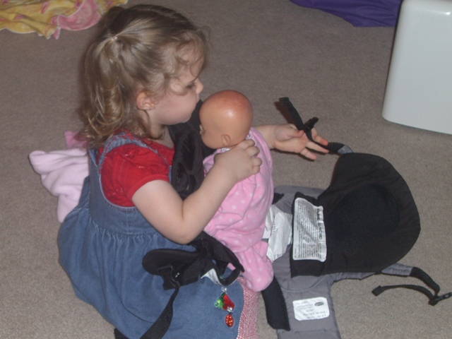 Emma using the Snugli